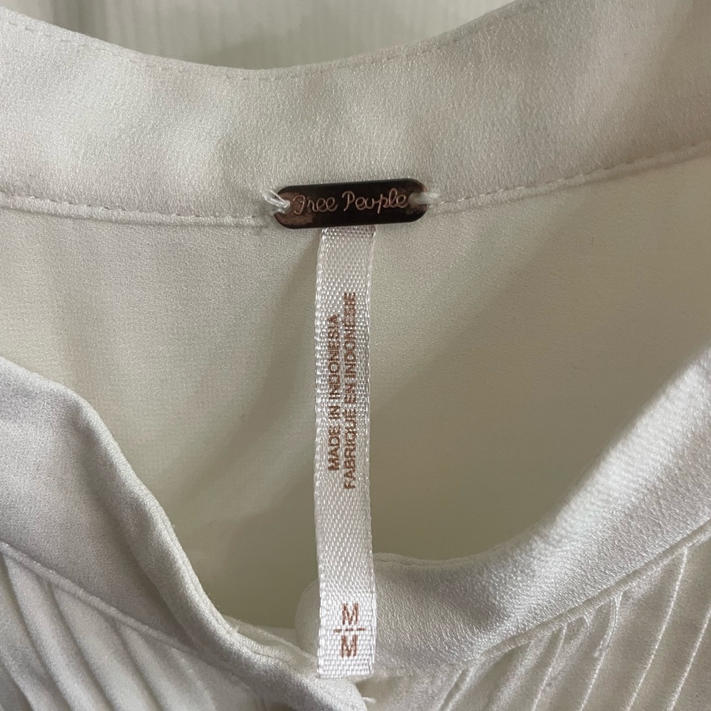 Free People blouse with ruffle sleeves